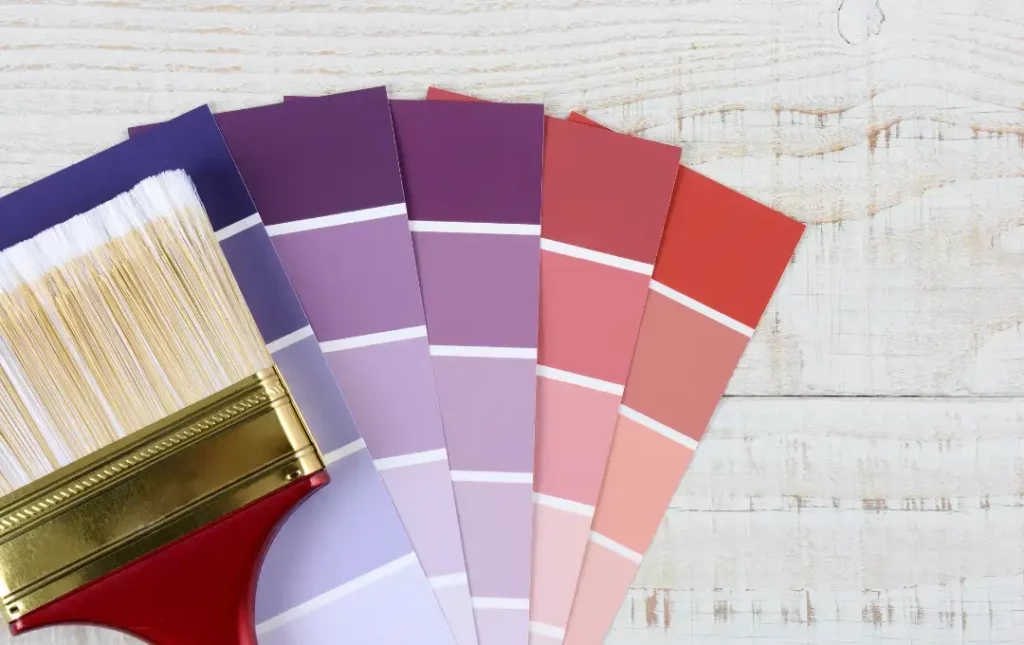Paint sample cards showing shades of purples and reds