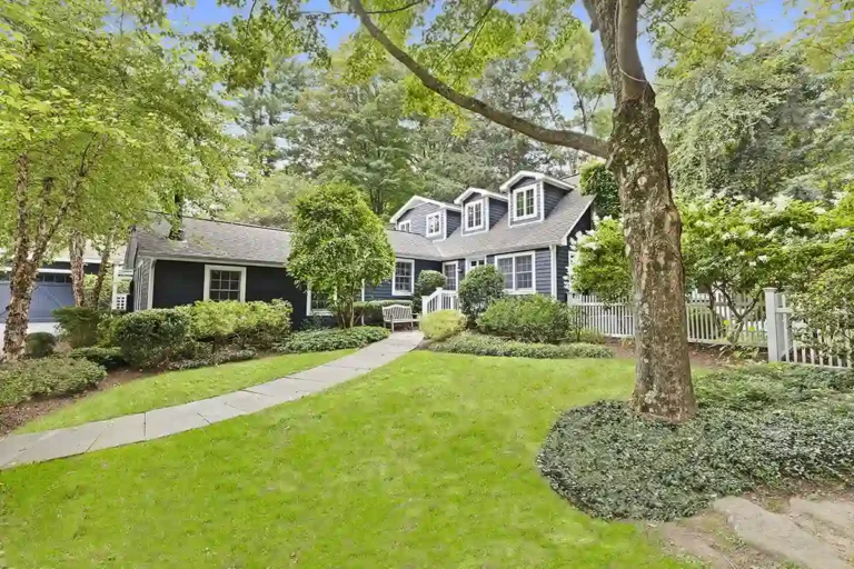 Suburban home with green lawn